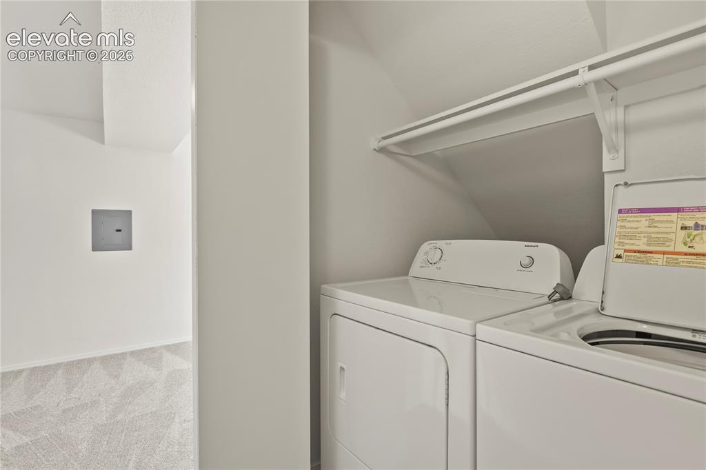 Image 25 of 33: Main level laundry