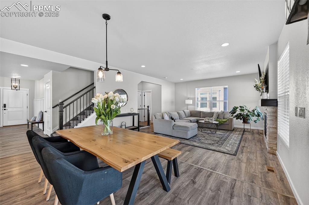 Image 10 of 43: Open concept from nook to great room