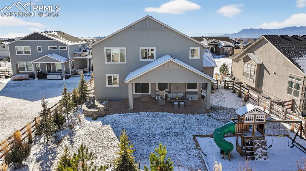 Image 39 of 43: Covered back patio, perfect for enjoying the outdoors!