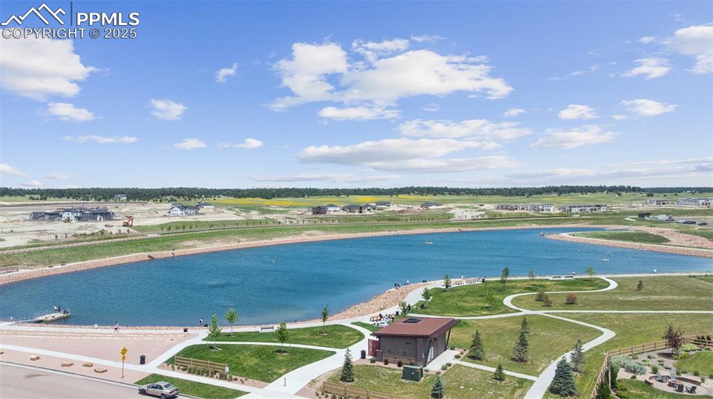 Image 40 of 43: Community lake for summer and winter fun!