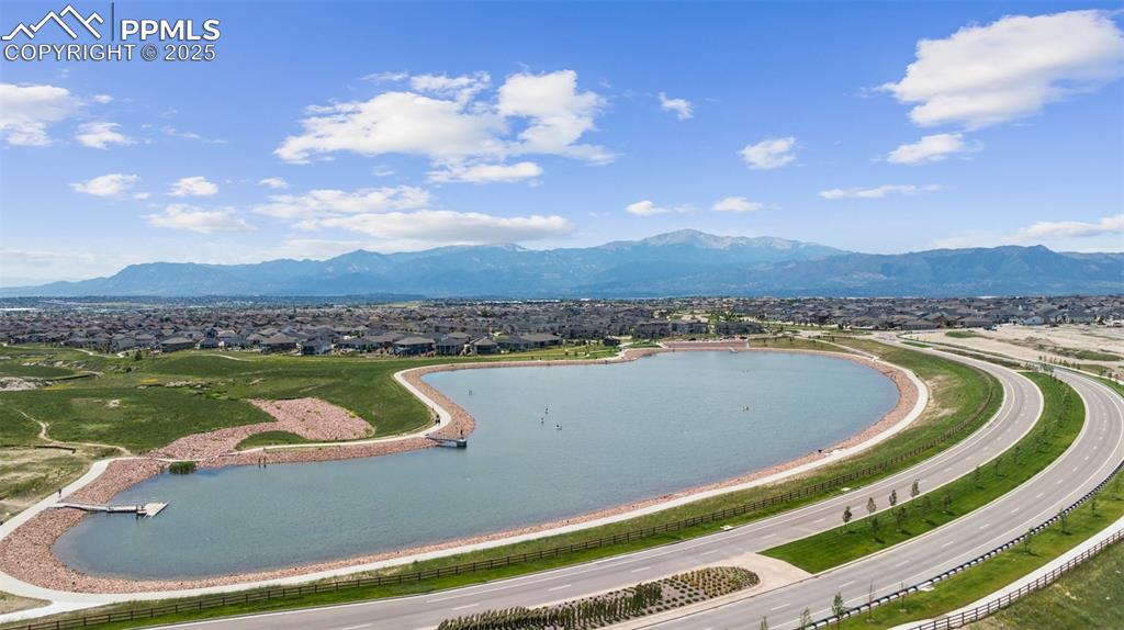 Image 41 of 43: Community lake and location for upcoming community center is within walking