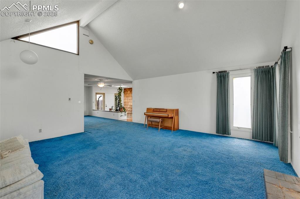 Image 10 of 50: Living room looking toward the entry
