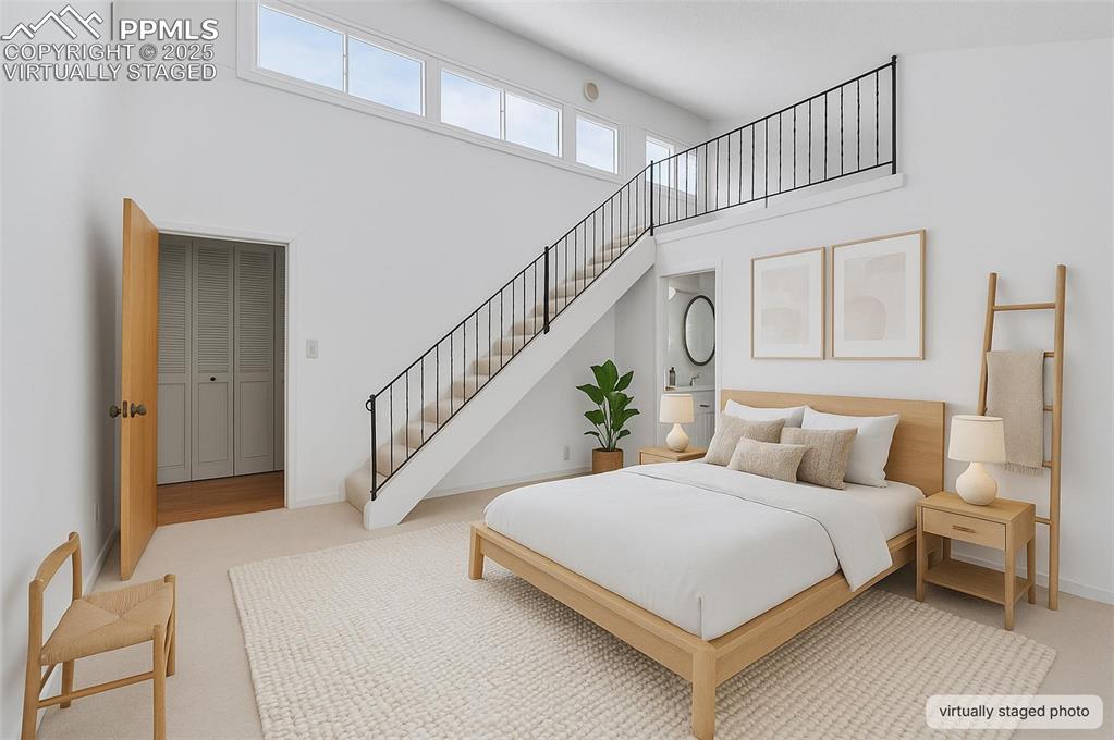 Image 21 of 50: Virtually staged primary bedroom