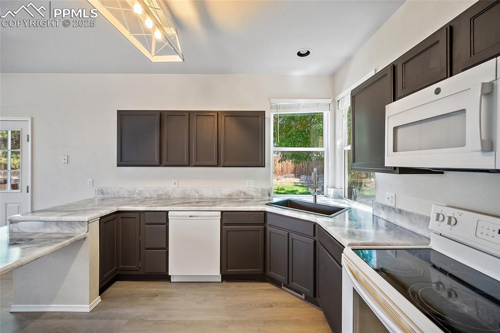 Image 15 of 46: Lots of counter space for prepping the evening meal or baking cookies.   