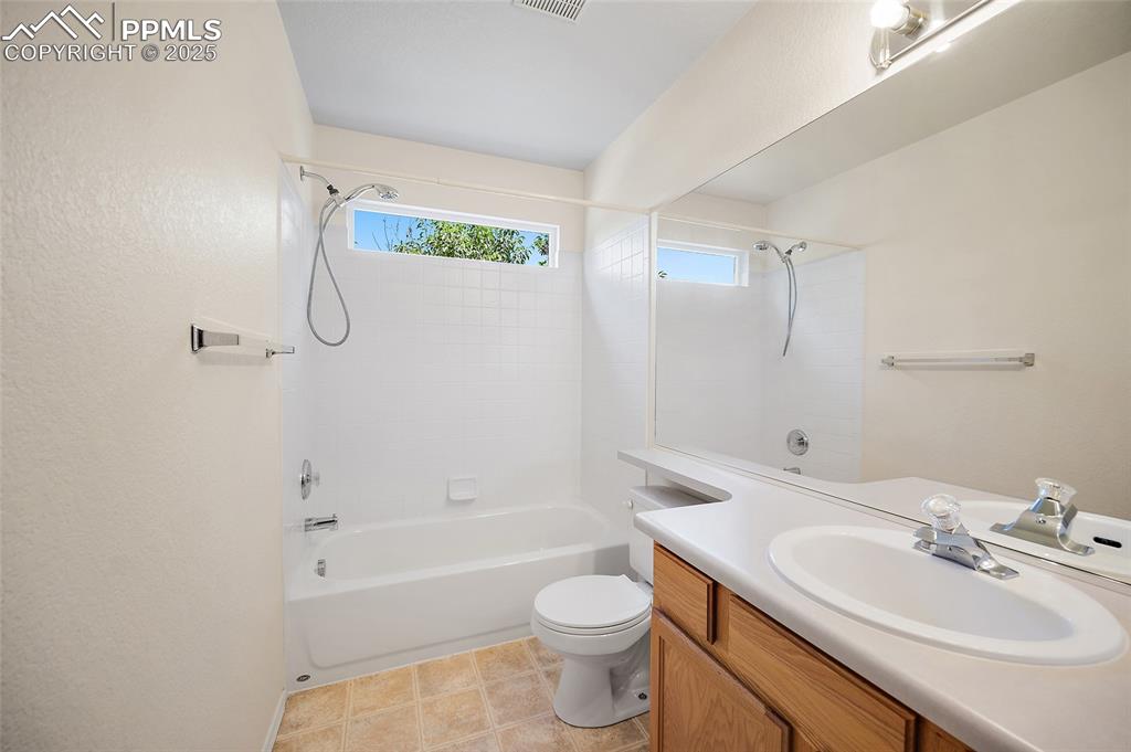 Image 30 of 46: Upper level bath. 