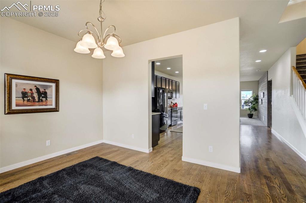 Image 19 of 50: Dining Room (Alternate View) – Another angle highlighting the spacious layo