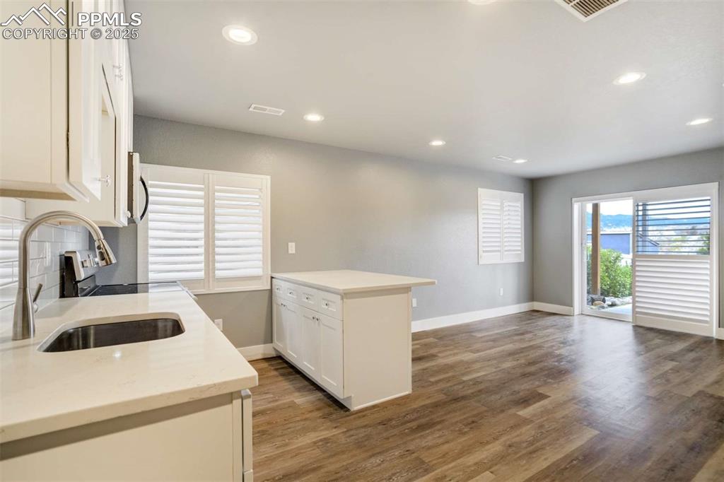Image 38 of 50: Basement Kitchenette (Wide View) – Beautifully finished kitchenette with wh