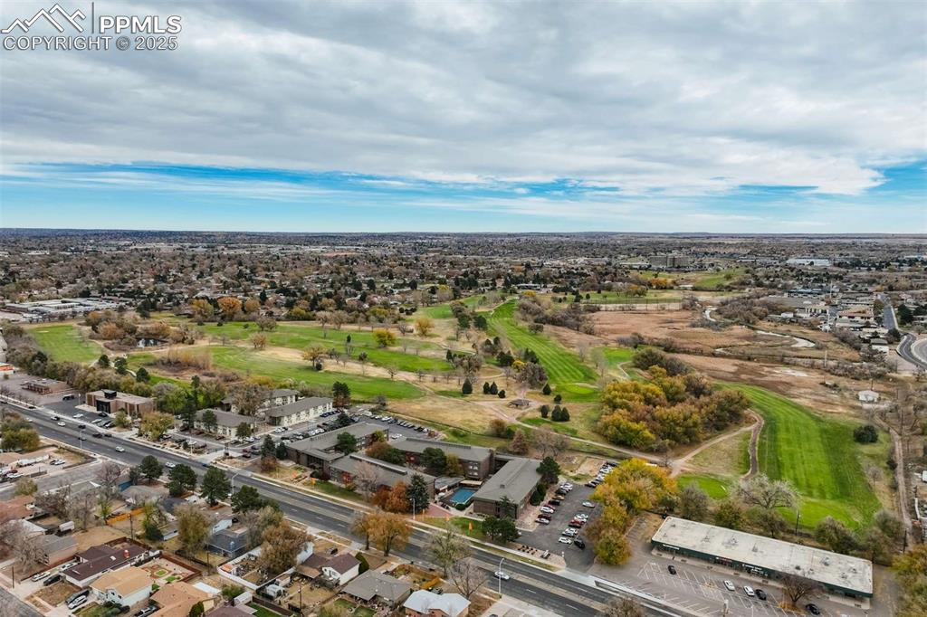 Image 7 of 50: Nearby Valley Hi Golf Course (Aerial) – Wide aerial shot of Valley Hi Golf 