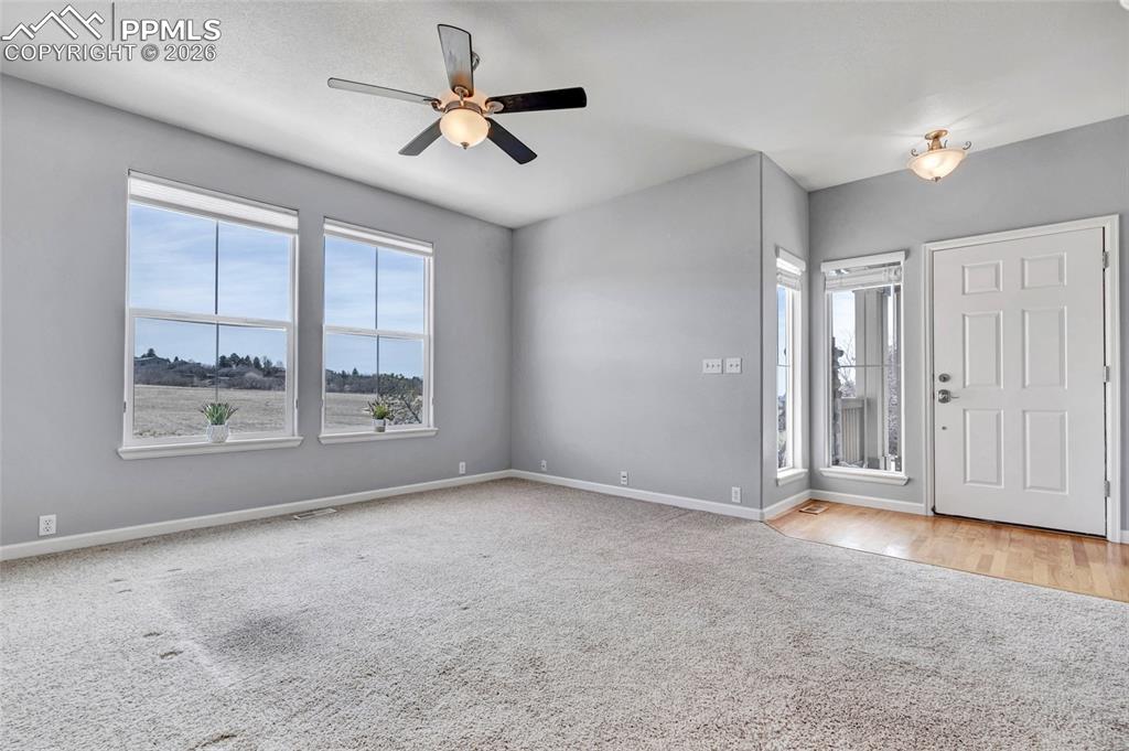 Image 10 of 38: View of open space, lots of natural light, new paint