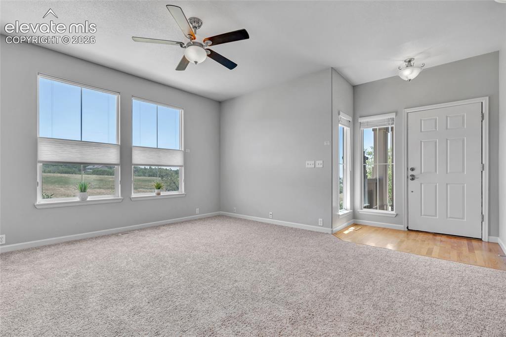 Image 12 of 42: View of open space, lots of natural light, new paint