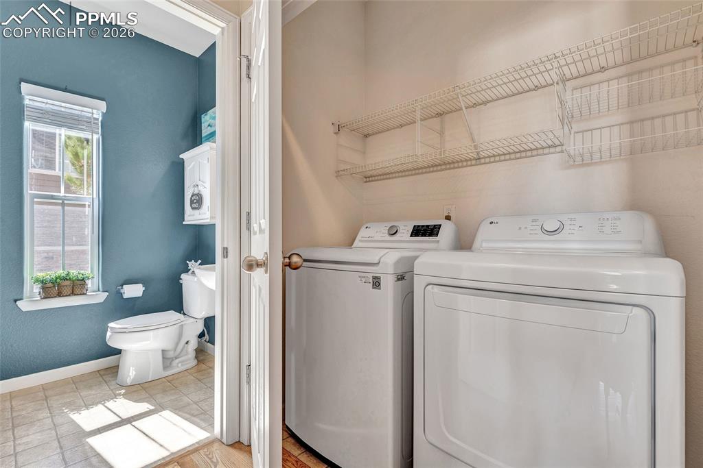 Image 16 of 38: Laundry on main level with matched washer and dryer