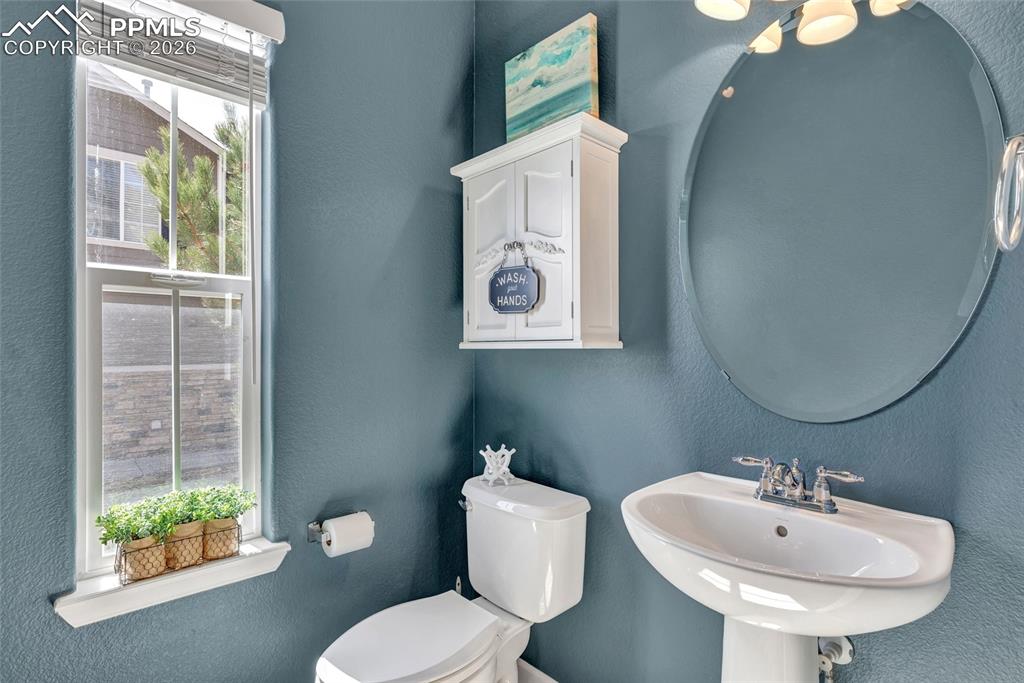 Image 17 of 38: Half bath on main level