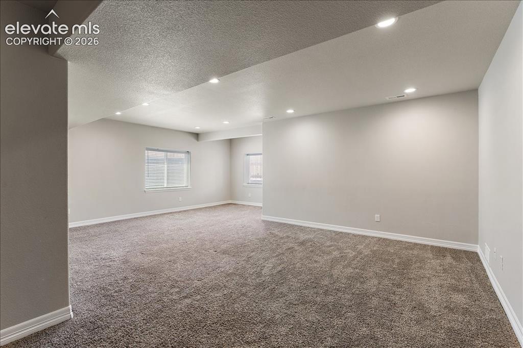 Image 17 of 48: Lower level family room