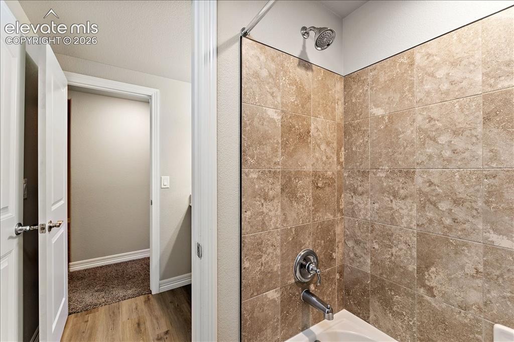 Image 24 of 48: Lower level full bath #4