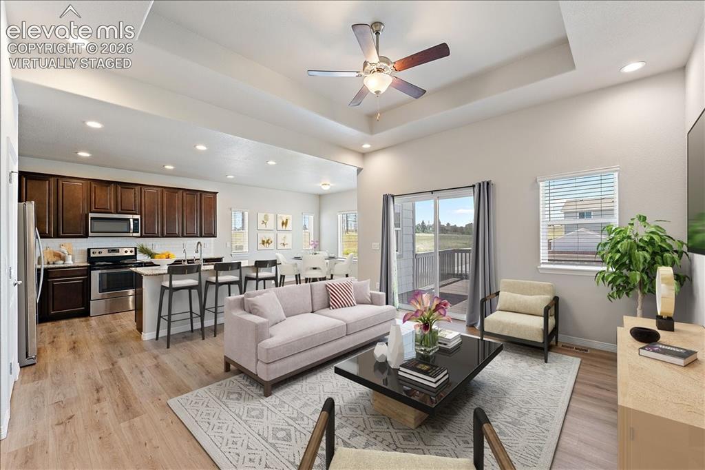 Image 3 of 48: Main level great room - lots of natural light - room for everyone - Virtual