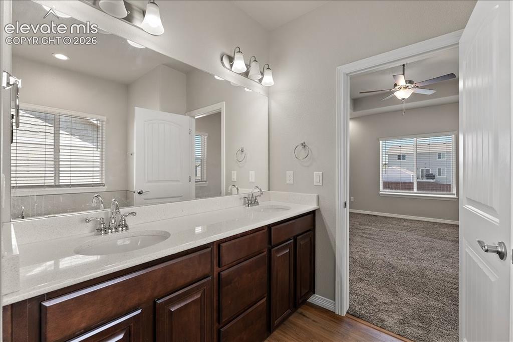 Image 9 of 48: Main level Primary bedroom five piece bathroom