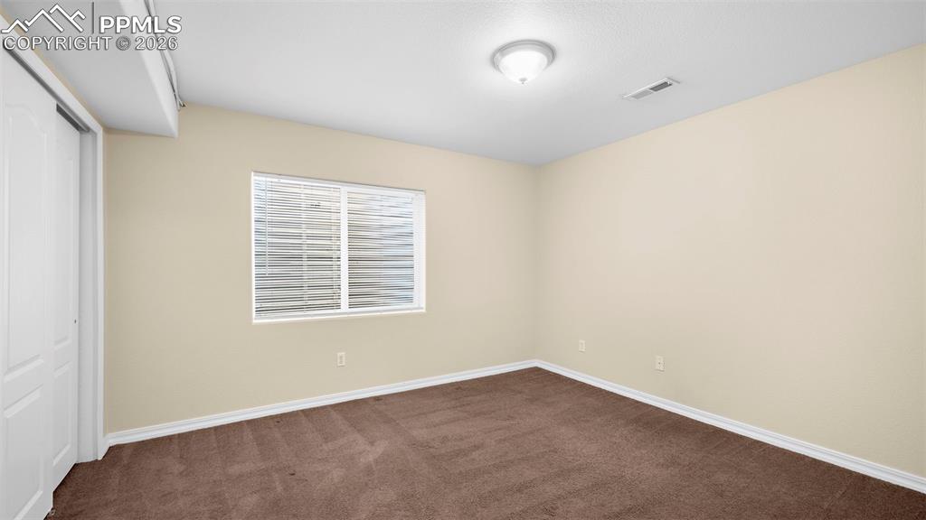 Image 32 of 38: Bedroom