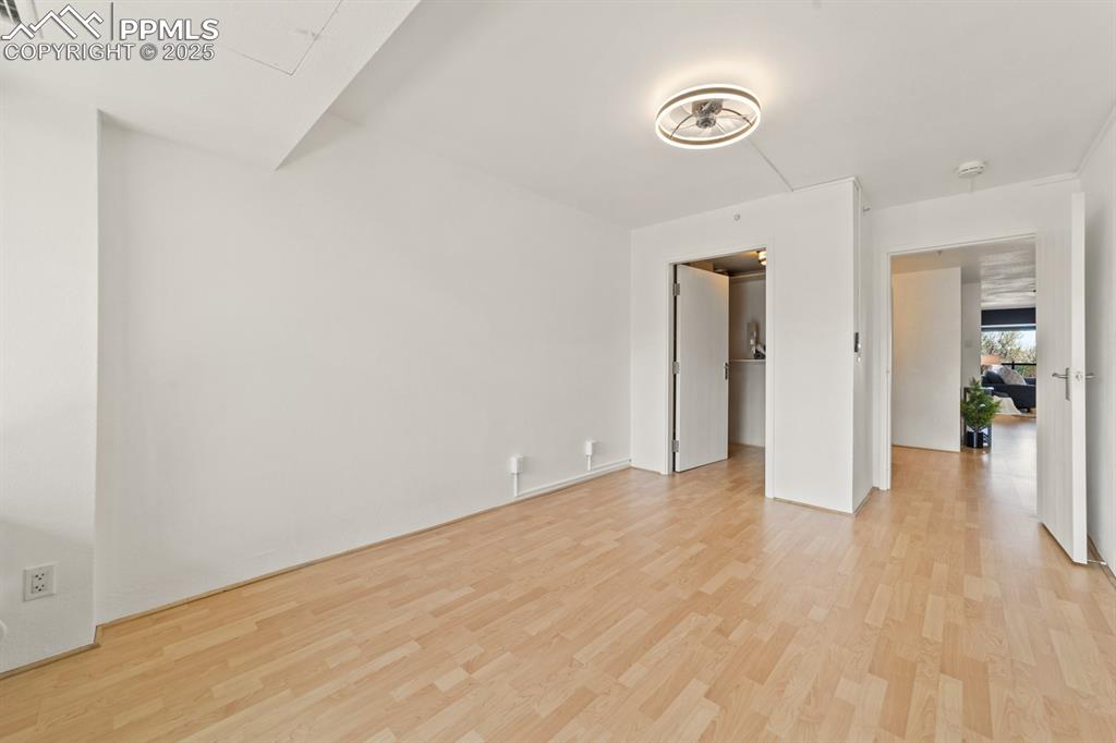 Image 18 of 32: Unfurnished room featuring light wood-style floors