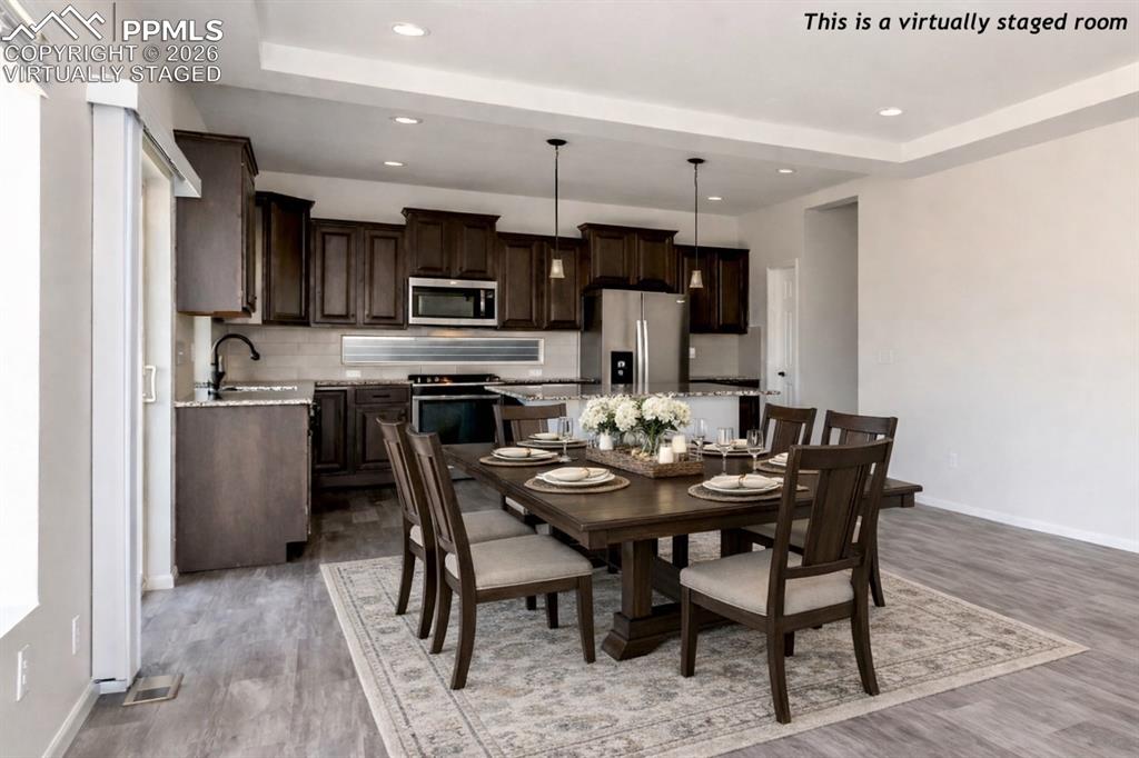 Image 12 of 50: Virtually Staged (Kitchen/Dining Area)