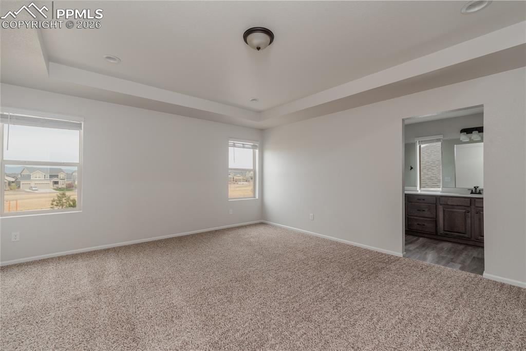 Image 18 of 50: Primary Bedroom - Amazing Views of Pikes Peak!