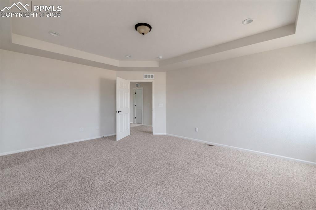 Image 19 of 50: Primary Bedroom - Amazing Views of Pikes Peak!