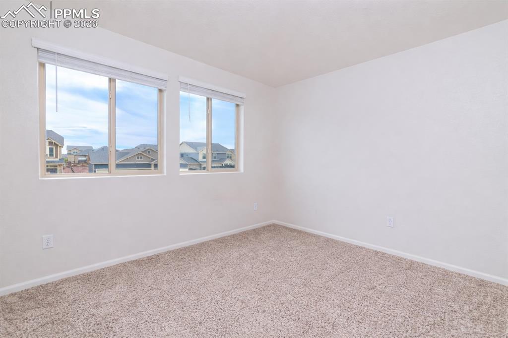 Image 27 of 50: Upper Level Bedroom