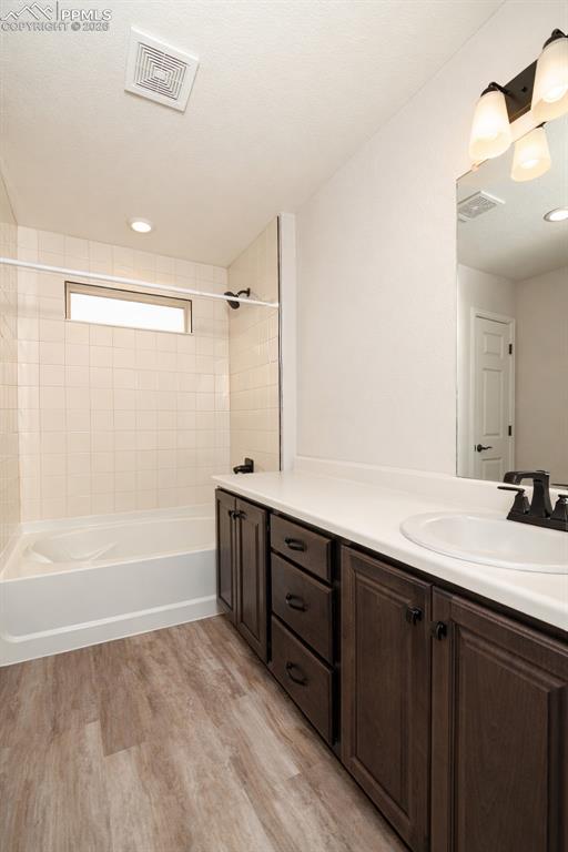 Image 36 of 50: Upper Level Full Bathroom