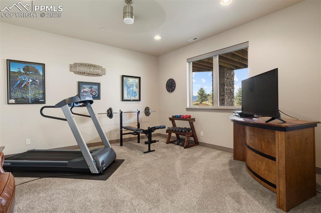 Image 19 of 31: Separate area off recreation room - for for gym, sitting area, or office.