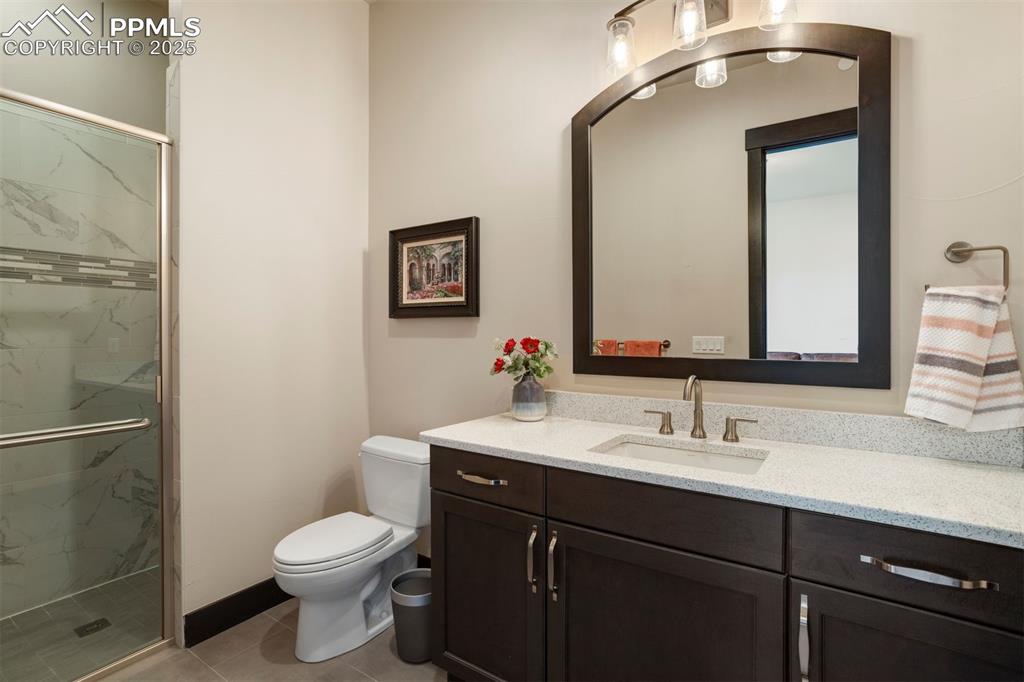 Image 22 of 31: Main-floor 3/4 ensuite bathroom.