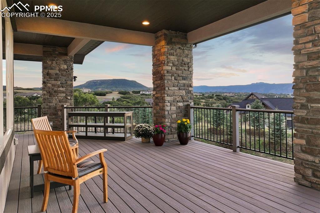 Image 3 of 31: The west-facing deck is ideal for evening gatherings or peaceful solitude -