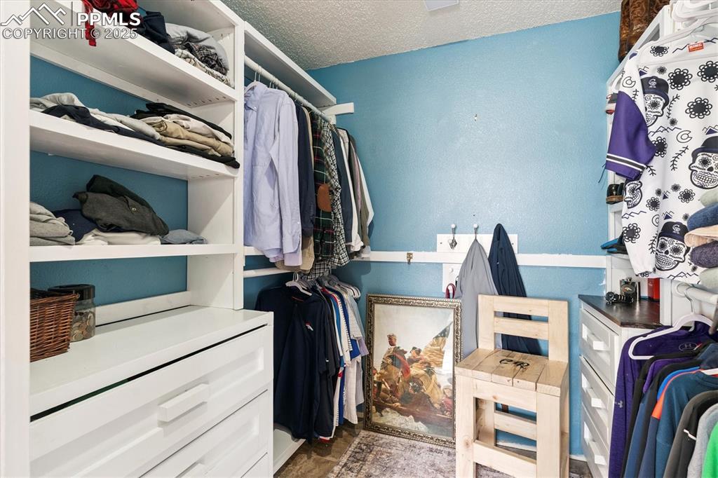 Image 29 of 40: View of walk in closet