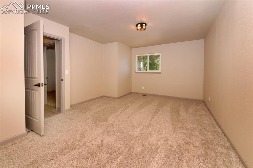 Image 18 of 49: Primary Bedroom