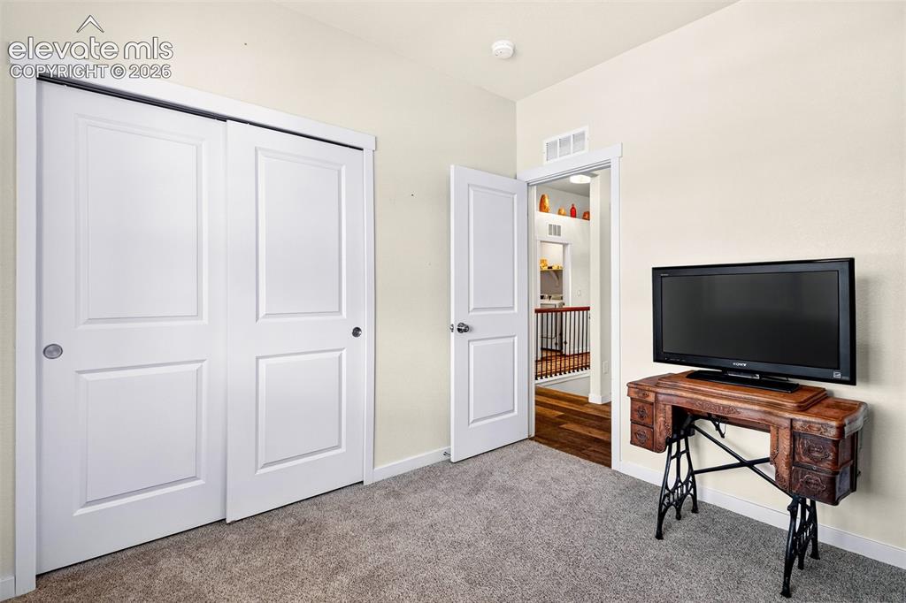 Image 7 of 49: Bedroom