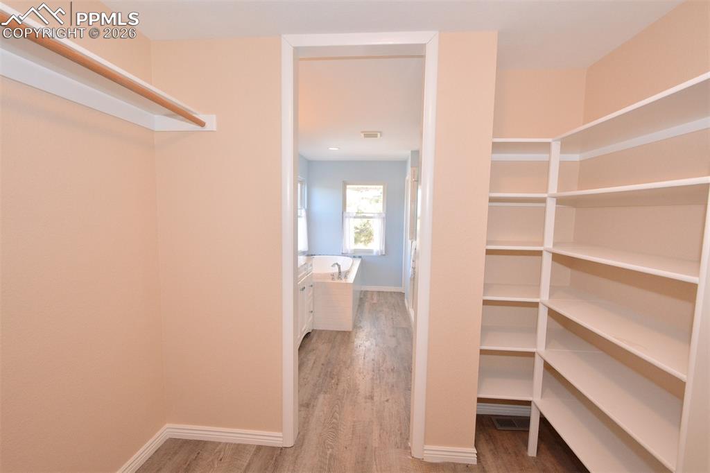 Image 27 of 50: Master Bedroom closet.