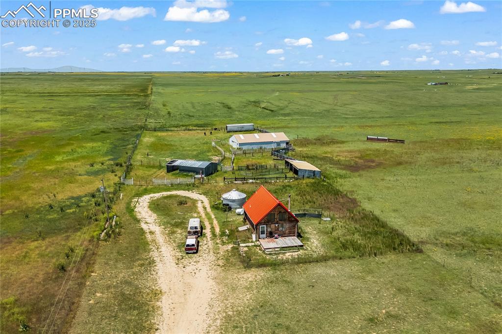 Image 39 of 50: Cabin property and out buildings