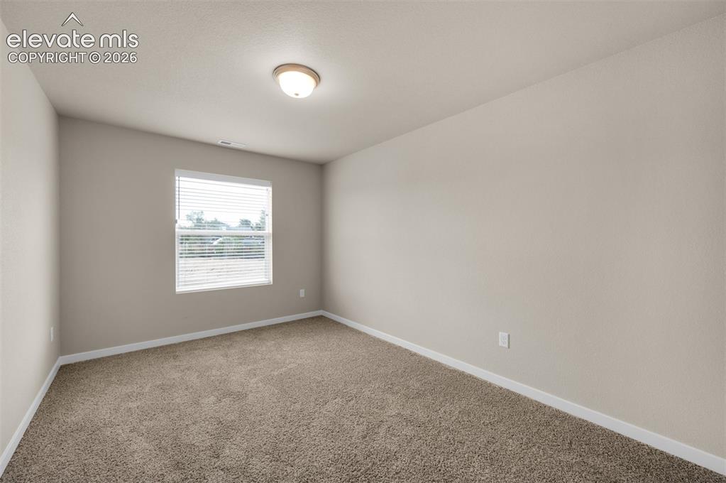 Image 19 of 26: Bedroom