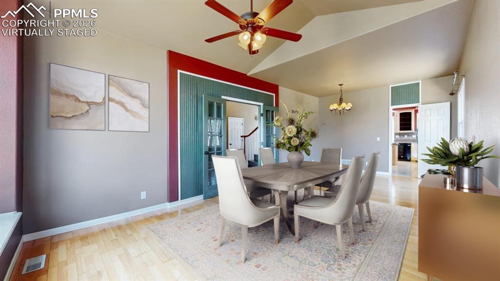 Image 11 of 50: Virtually Staged dining room