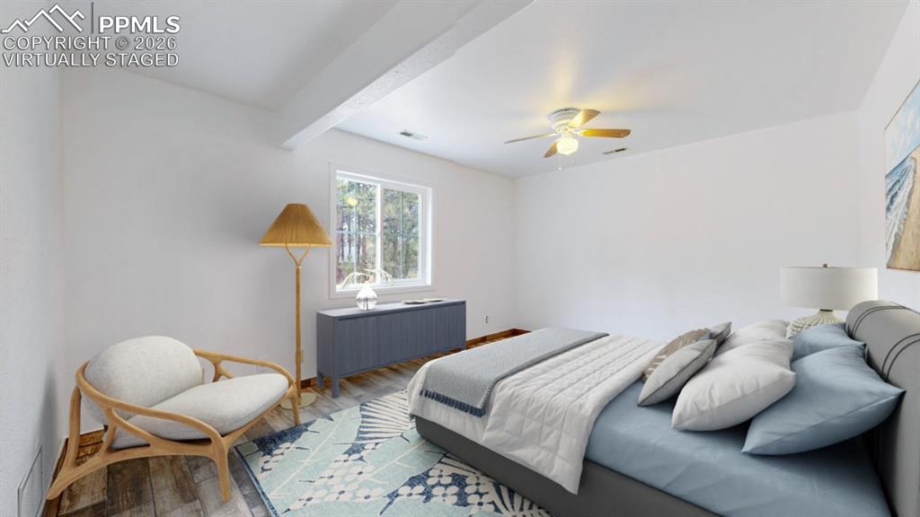 Image 23 of 50: Virtually Staged bedroom 4 in the basement