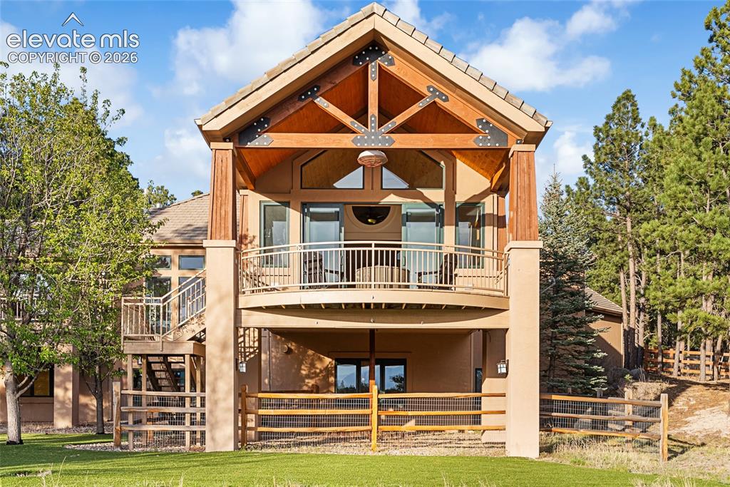Image 40 of 42: Enjoy Pikes Peak Views from Deck and Lower Level Patio