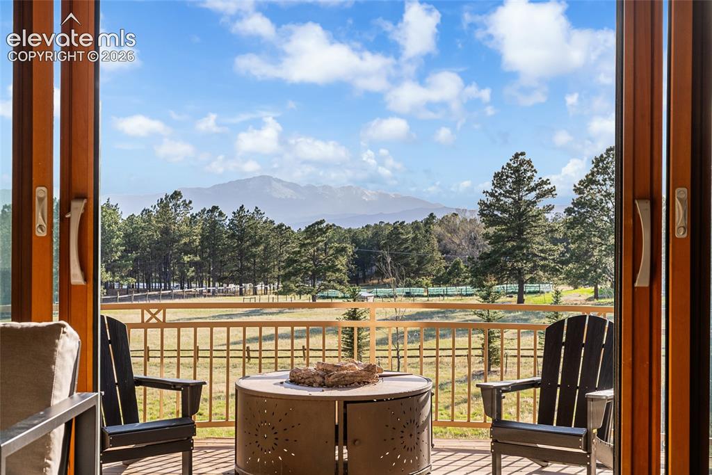 Image 5 of 42: Deck with Stunning Pikes Peak Views
