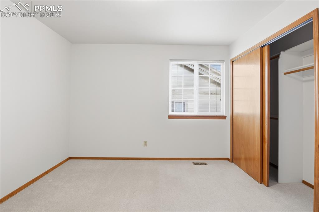 Image 24 of 38: Bedroom