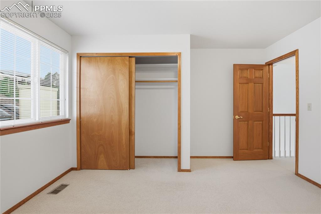 Image 27 of 38: Bedroom