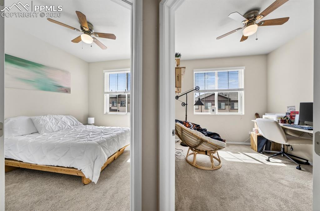 Image 31 of 42: View to the other 2 bedrooms upstairs, opposite end of the hall, from the p