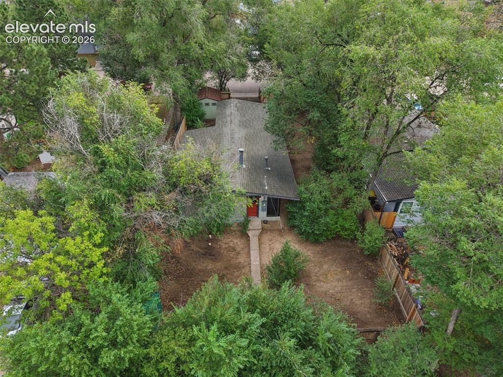 Image 28 of 36: Single-story residence with an asphalt shingle roof