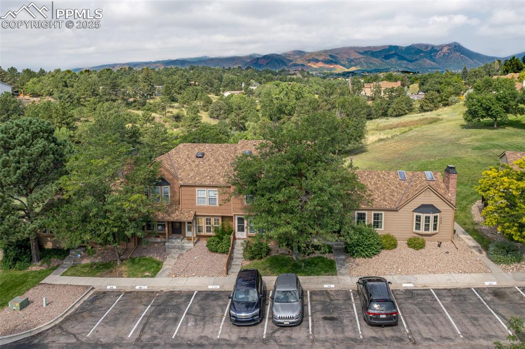 Image 2 of 27: Aerial view of property backs to open space and surrounding mountainous bac