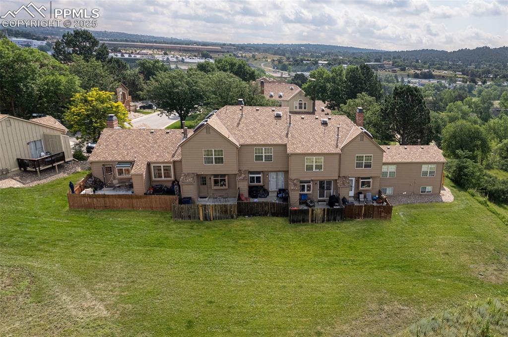 Image 3 of 27: Aerial view of the back of the property and surrounding area