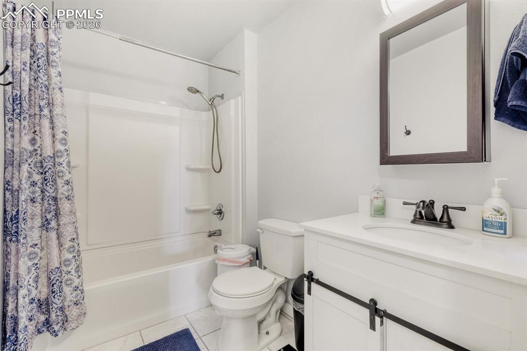 Image 24 of 28: Bedroom