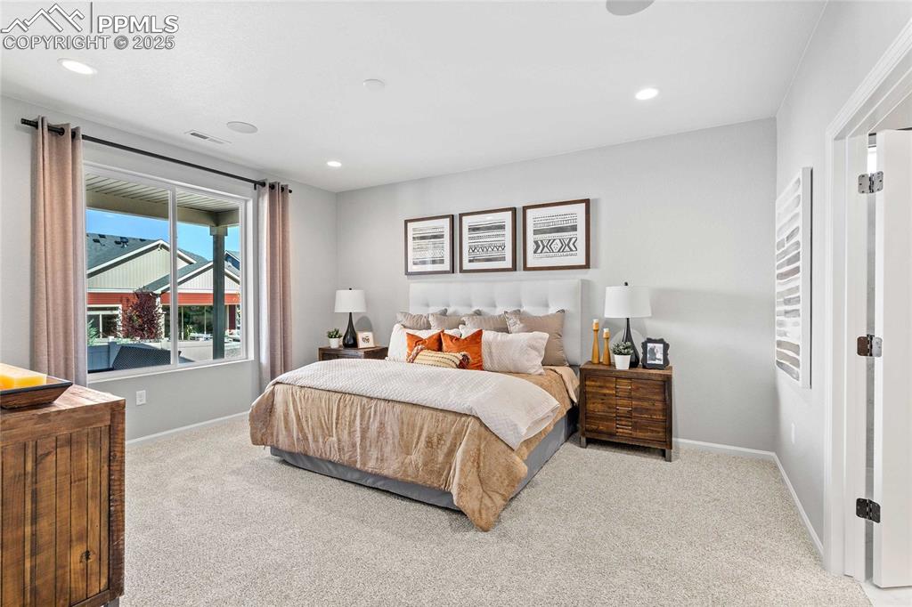 Image 22 of 27: Bedroom featuring carpet floors and recessed lighting