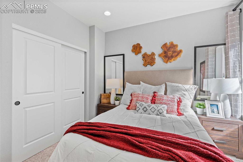 Image 26 of 27: Bedroom featuring a closet and recessed lighting