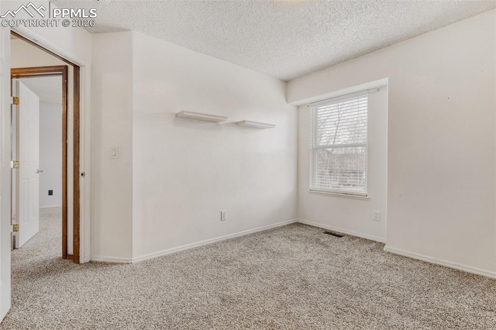 Image 12 of 17: 3rd Bedroom - Upper Level